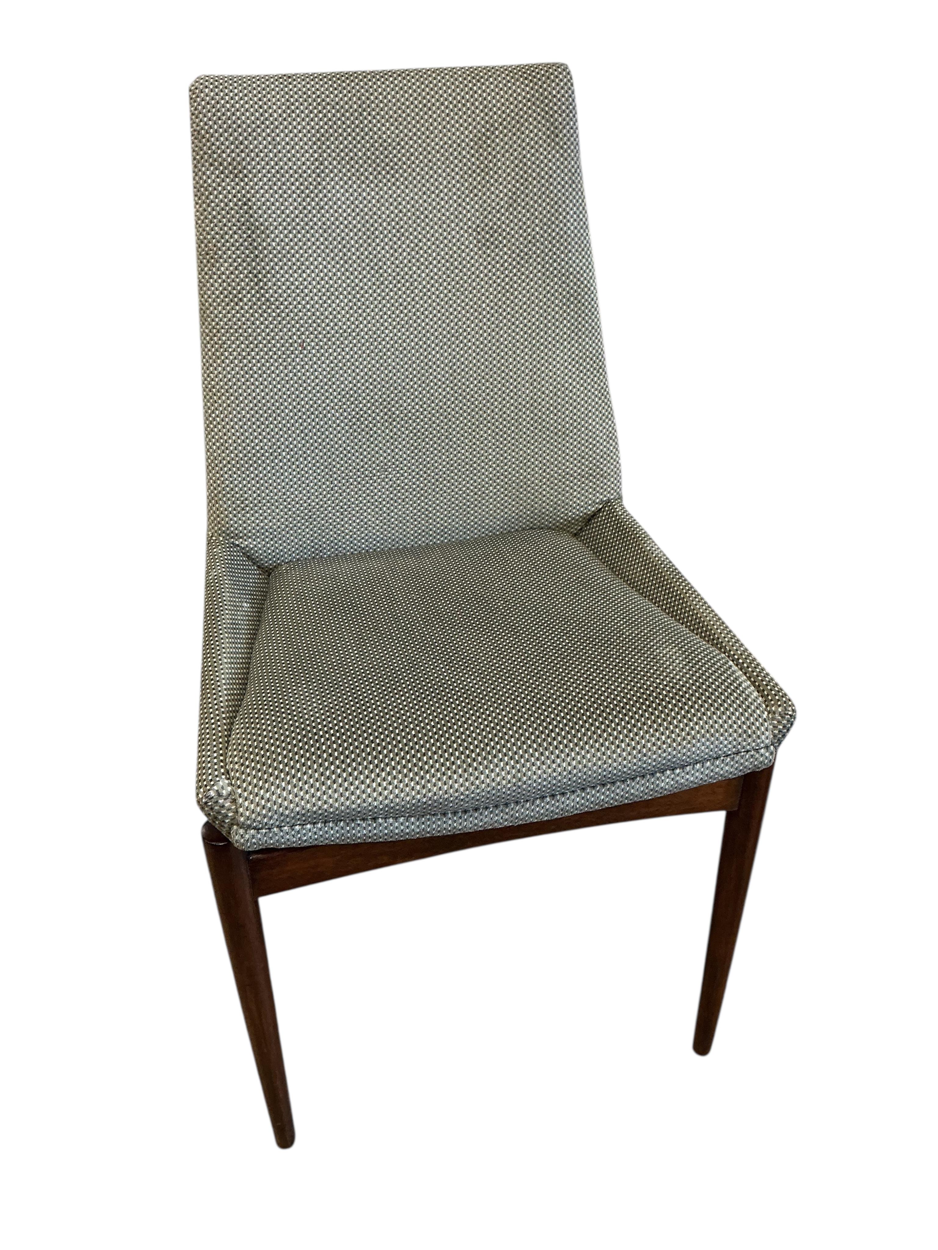 A mid century Archie Shine Indian rosewood extending dining table, width 144cm, depth 84cm, height 72cm and six upholstered chairs, two with arms